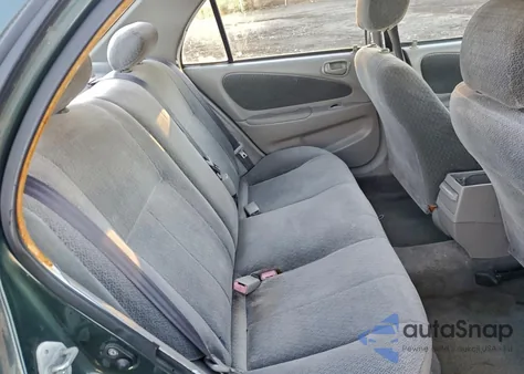 2002 Toyota Corolla Ce из США, поврежденный, VIN 2T1BR12E72C549796